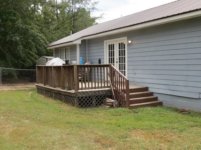 430 Pioneer Road Macon, GA 31217 - Photo 18 of 23 a view of a house with a yard