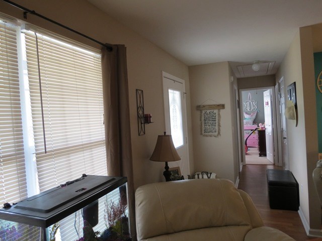 430 Pioneer Road Macon, GA 31217 - Photo 3 of 23 a bedroom with a bed and wooden floor