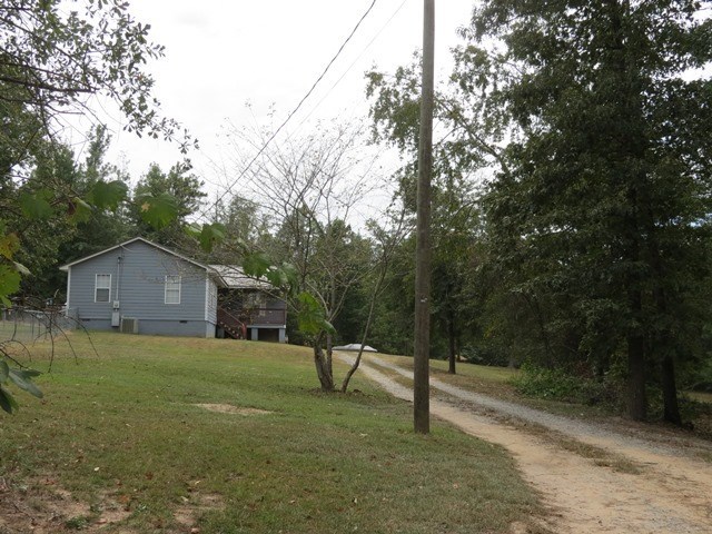 430 Pioneer Road Macon, GA 31217 - Photo 23 of 23 a view of a house with a yard