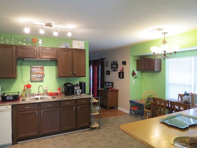 430 Pioneer Road Macon, GA 31217 - Photo 8 of 23 a kitchen with sink cabinets and window