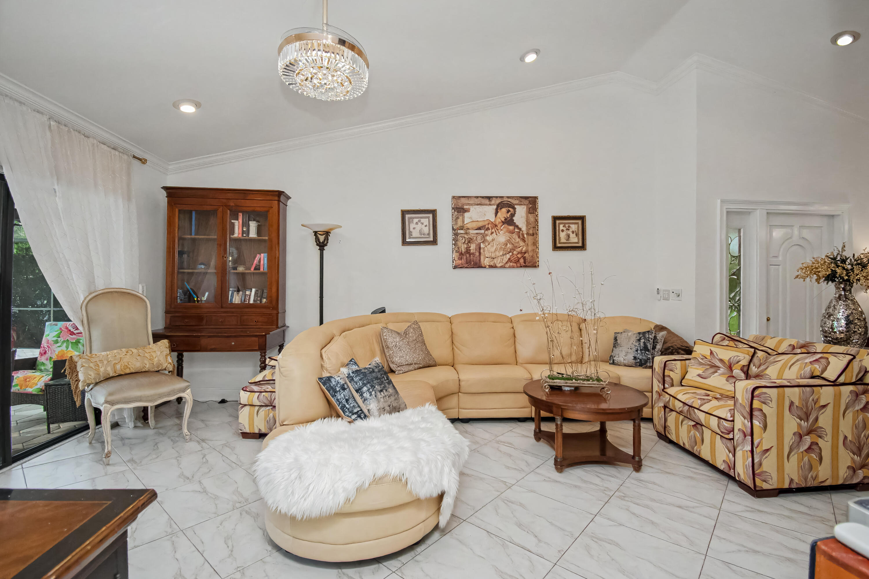 9708 Erica Court Boca Raton, FL 33496 - Photo 13 of 54 a living room with furniture and a table
