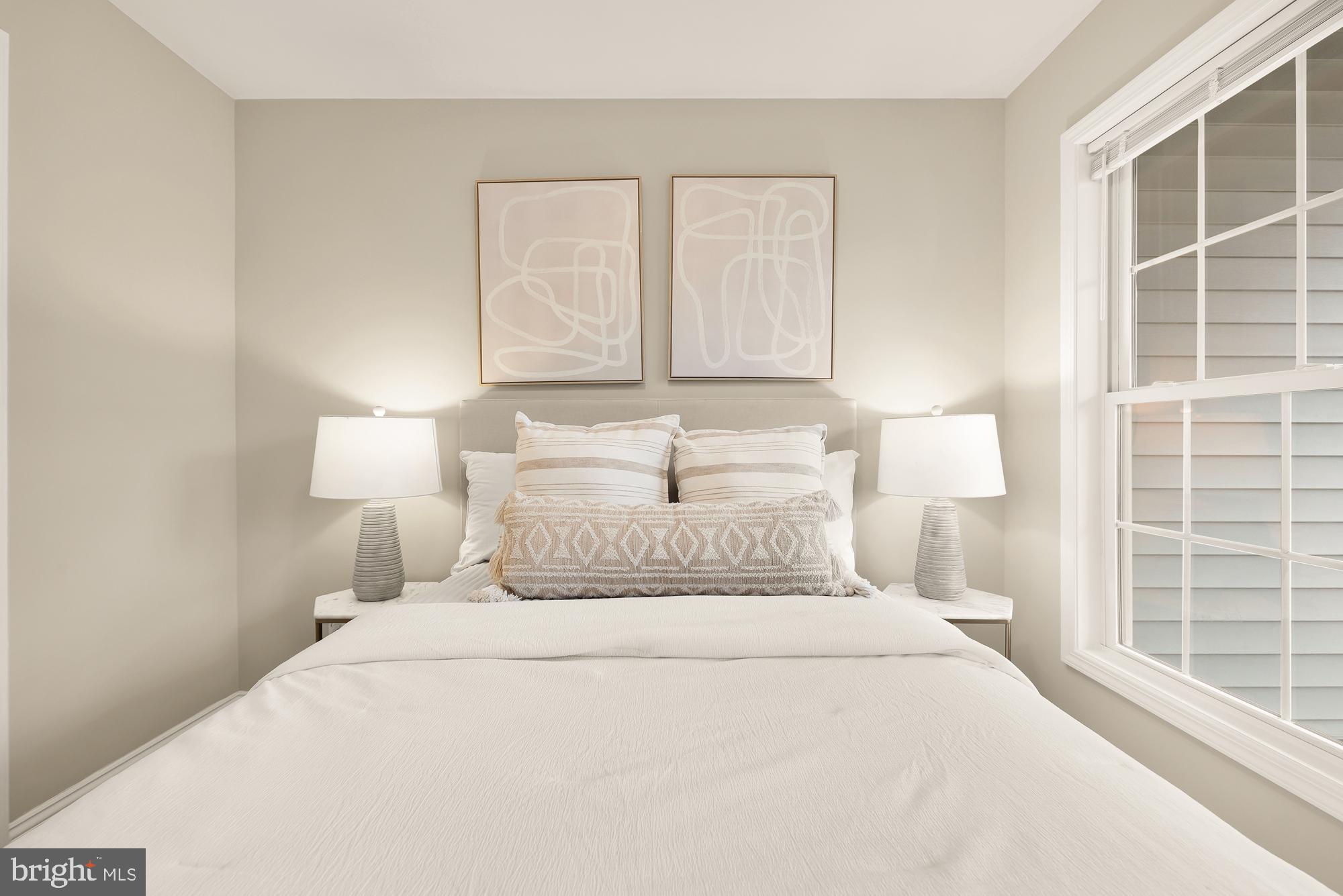 1751 W Street Southeast, Unit B Washington, DC 20020 - Photo 22 of 25 a bedroom with a bed and a window