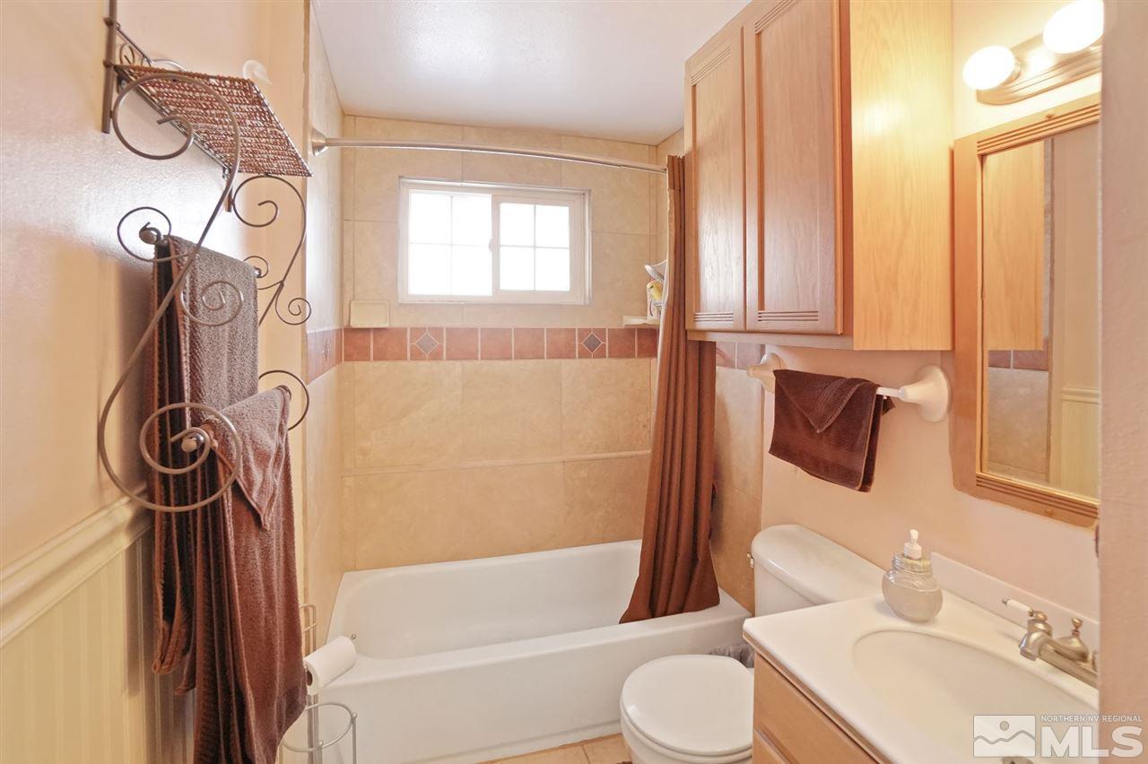 3800 Alcorn Road Fallon, NV 89406 - Photo 8 of 18 a bathroom with a toilet and a shower