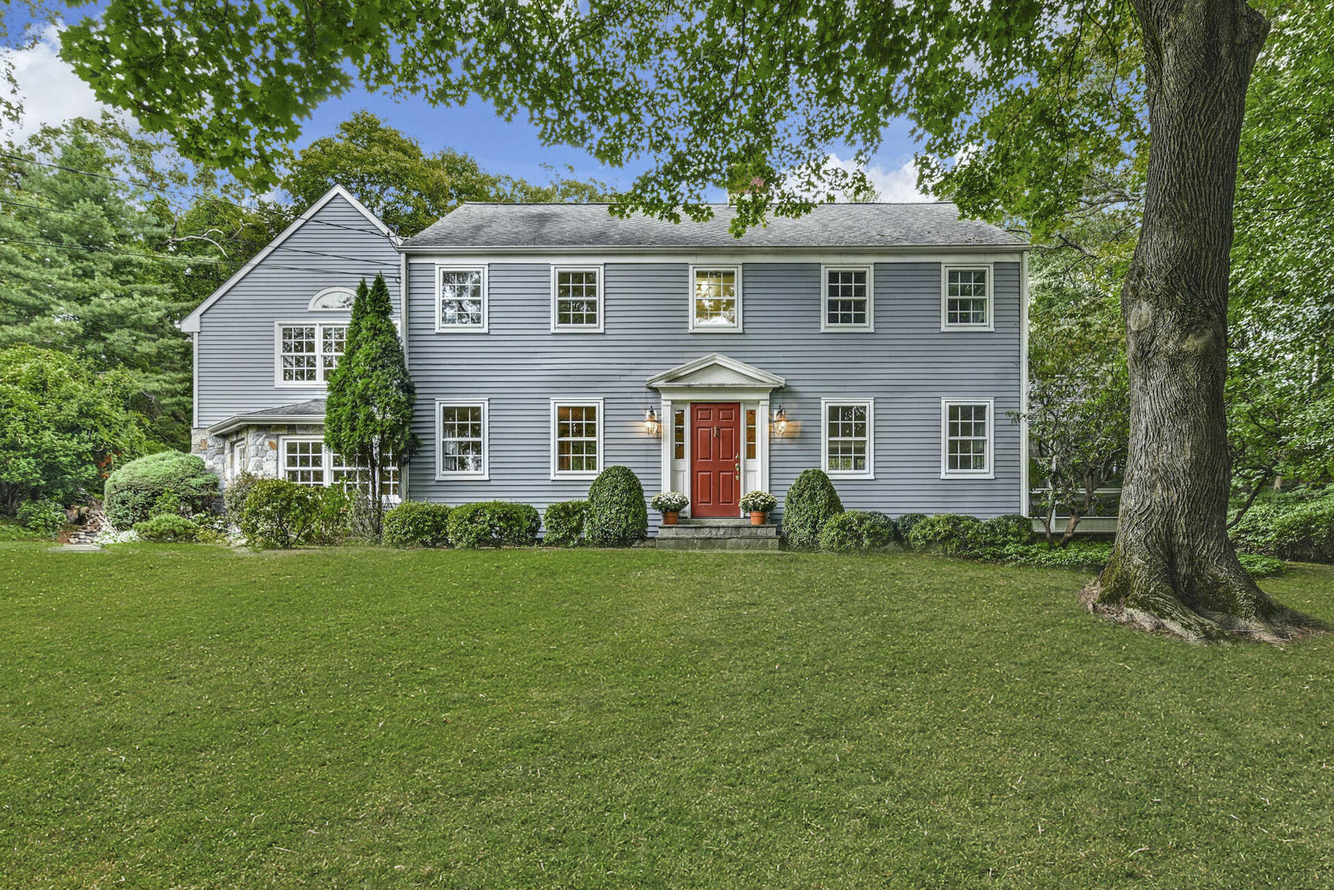 15 Briar Brae Road Darien, CT 06820 - Photo 2 of 32 a front view of a house with a yard
