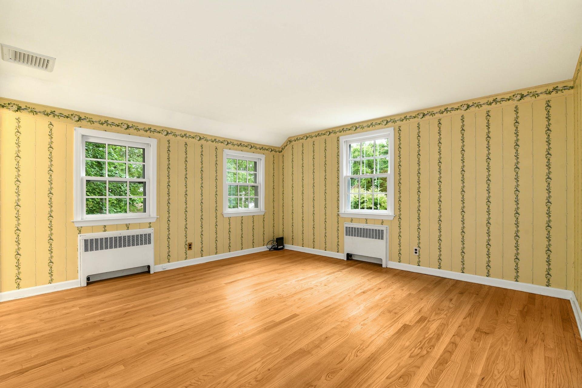15 Briar Brae Road Darien, CT 06820 - Photo 23 of 32 a view of an empty room with wooden floor and a window