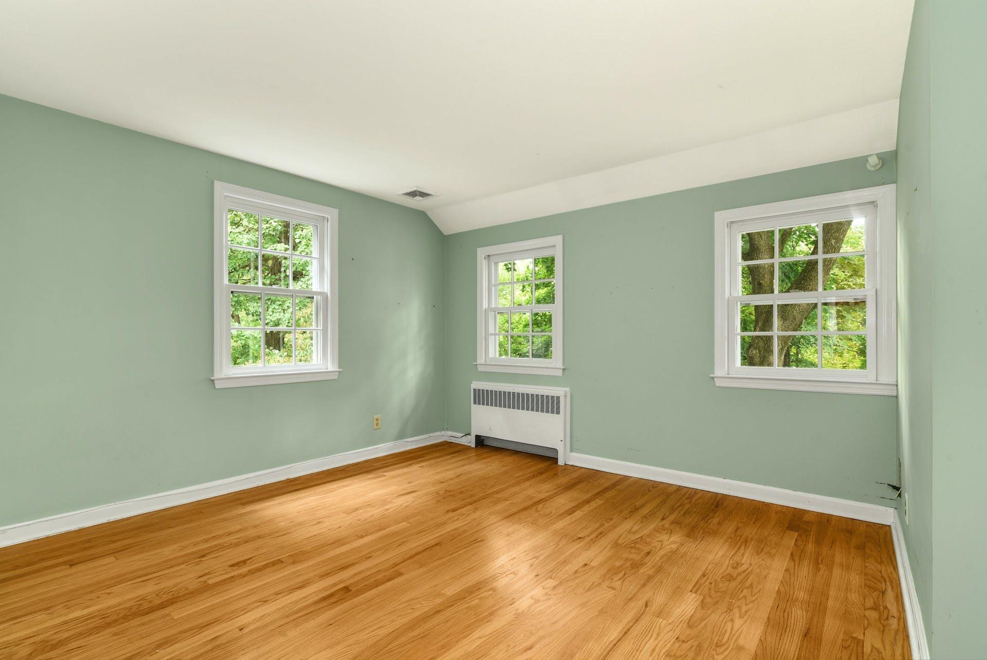 15 Briar Brae Road Darien, CT 06820 - Photo 25 of 32 a view of an empty room with wooden floor and a window