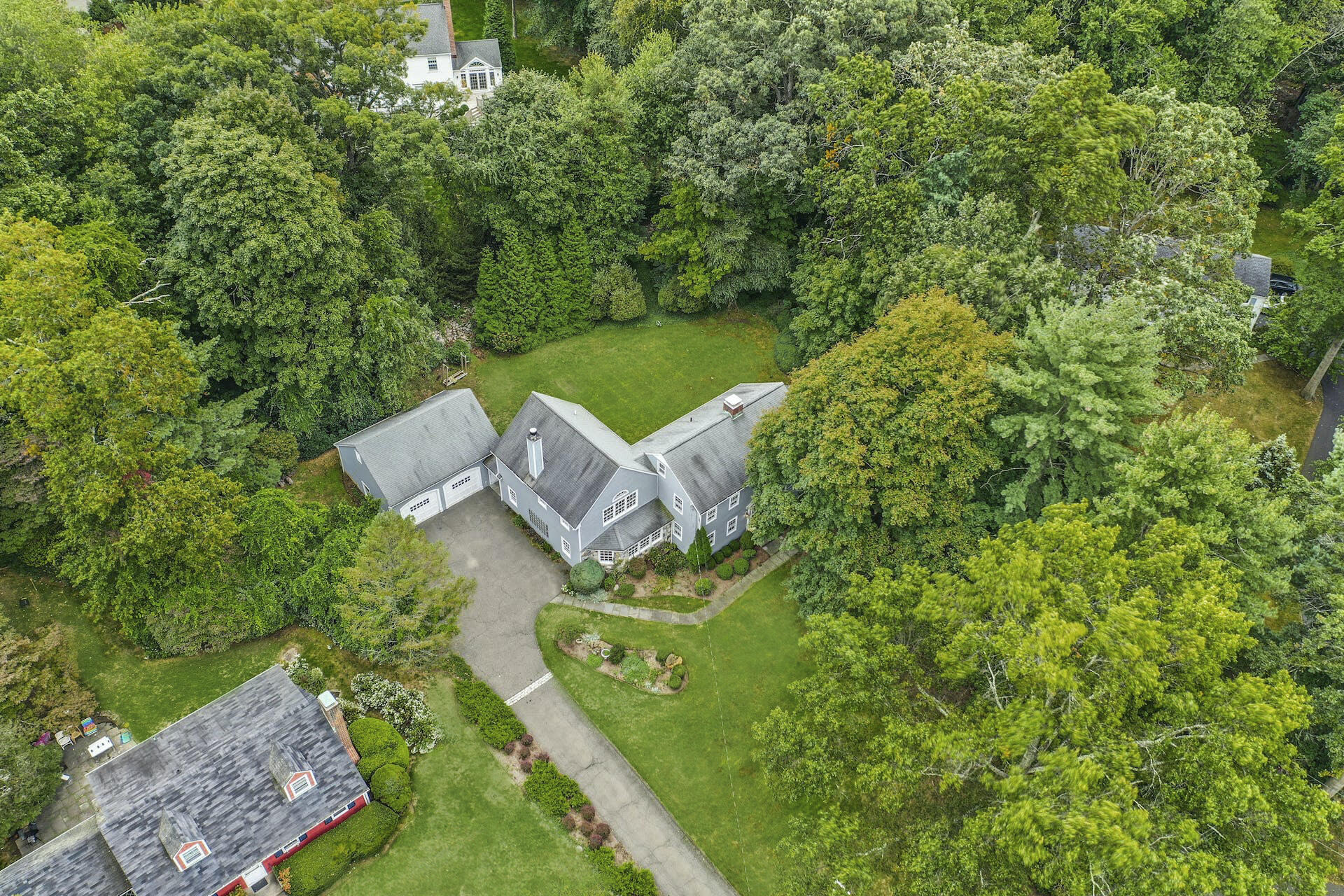 15 Briar Brae Road Darien, CT 06820 - Photo 28 of 32 an aerial view of a house with a yard basket ball court and outdoor seating