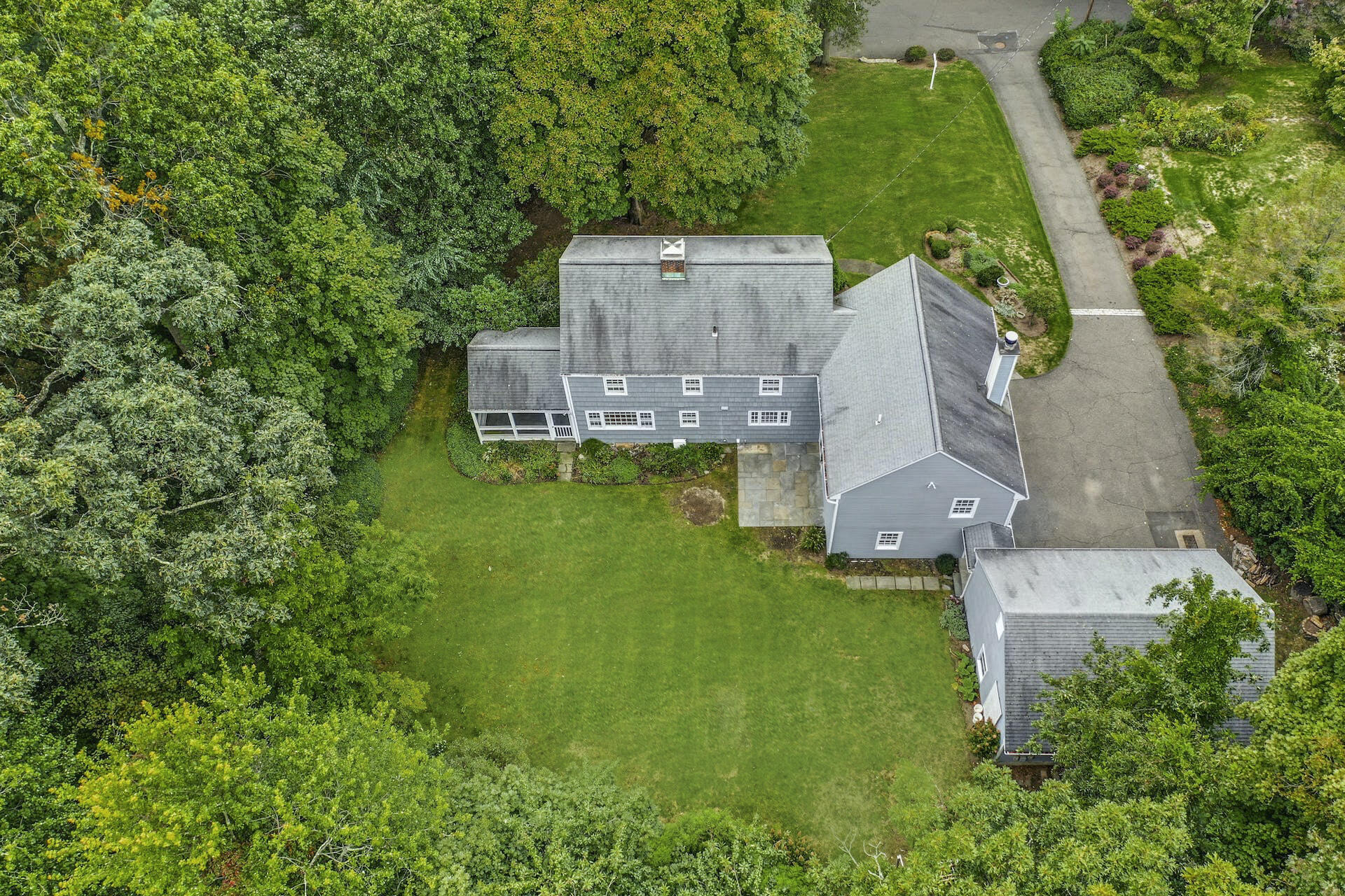 15 Briar Brae Road Darien, CT 06820 - Photo 29 of 32 an aerial view of a house with a garden