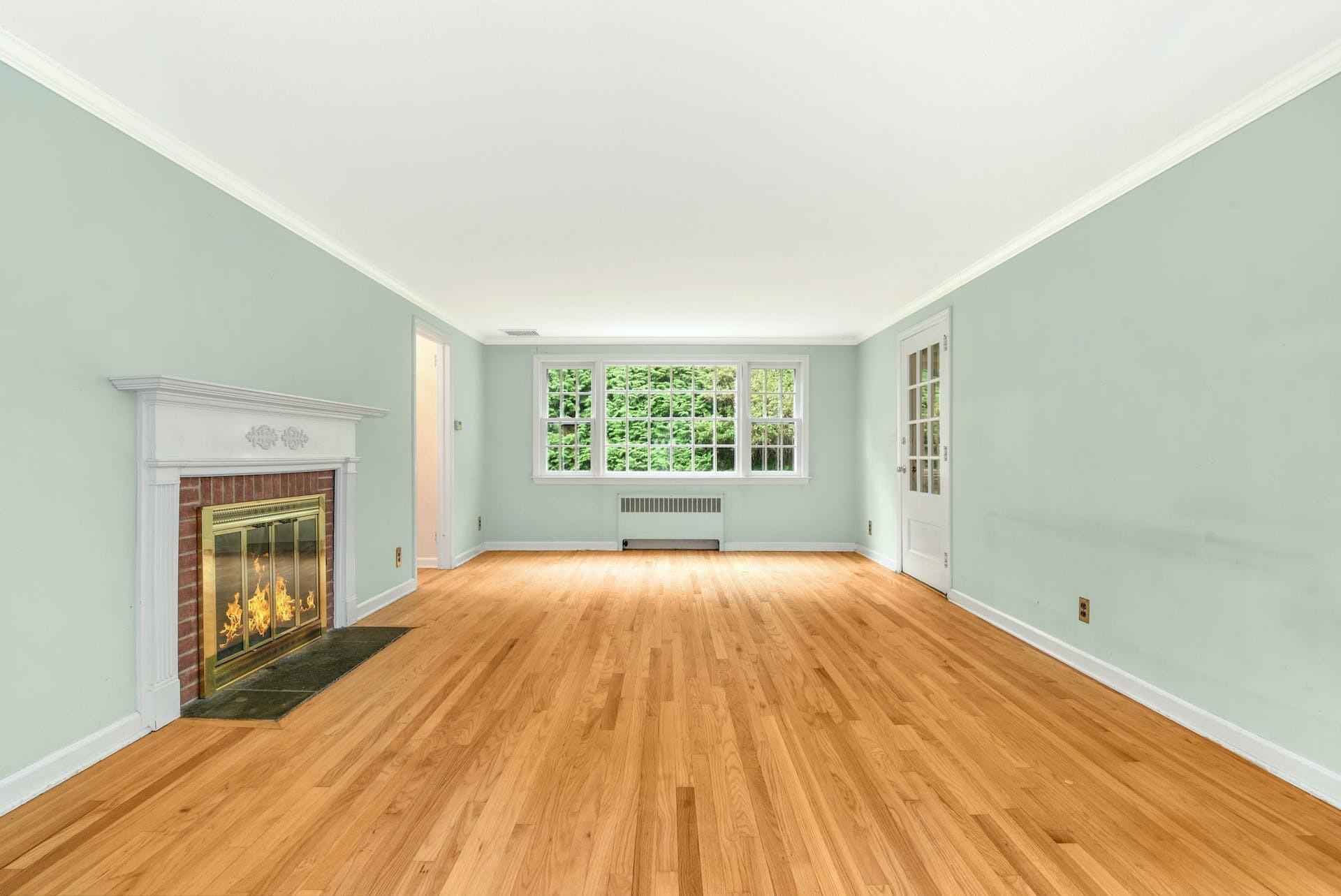 15 Briar Brae Road Darien, CT 06820 - Photo 4 of 32 a view of empty room with wooden floor and fan