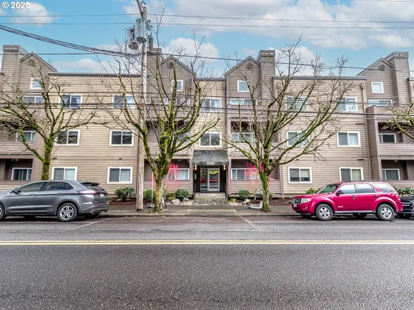 a cars parked in front of a building