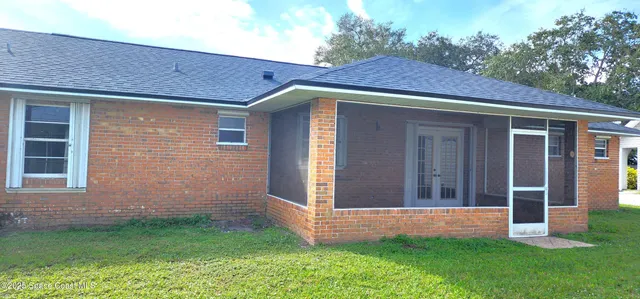 a view of swimming pool with patio