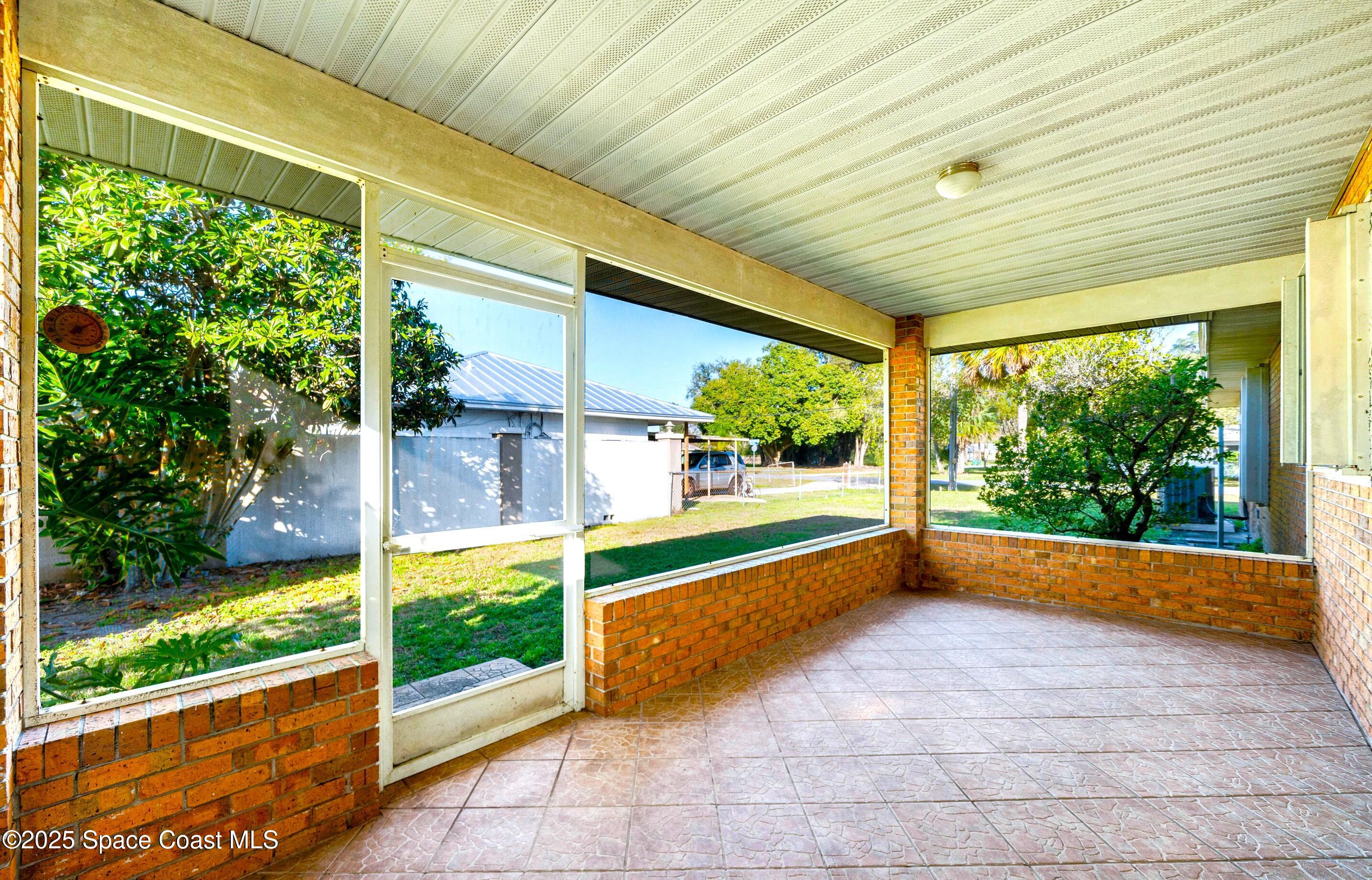 7746 Mango Grove Avenue Melbourne, FL 32904 - Photo 16 of 17 a view of swimming pool with patio