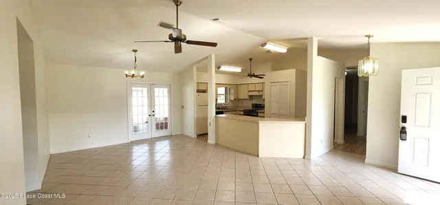 a kitchen with a cabinets and a stove top oven