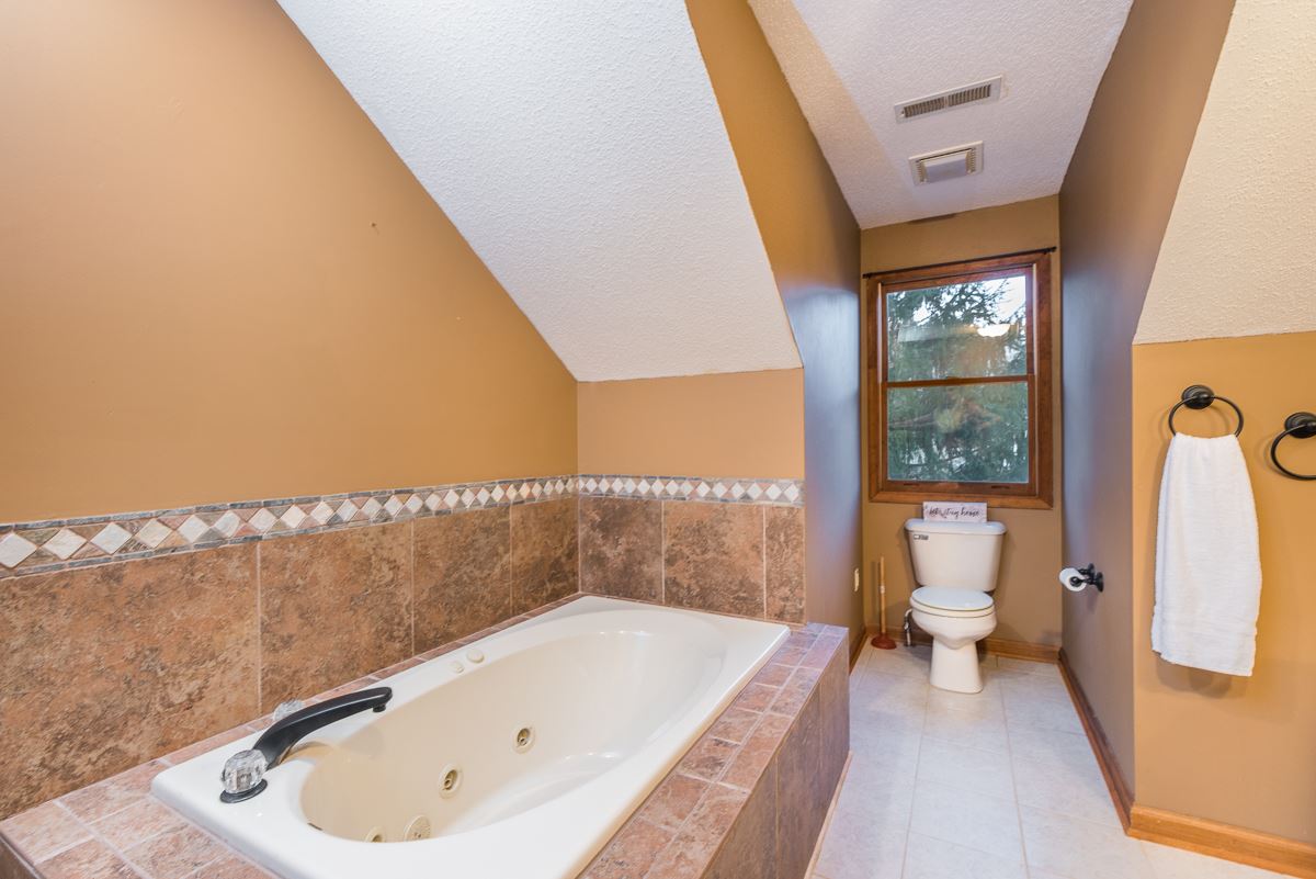 403 Purple Cow Road Waynesboro, VA 22980 - Photo 37 of 50 a bathroom with a tub and sink