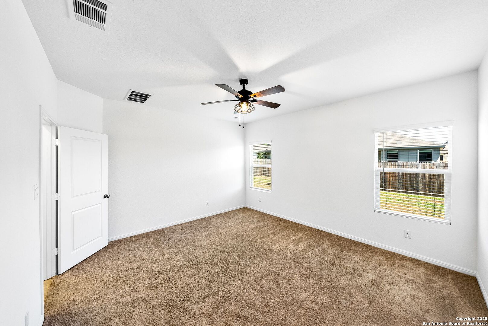 31920 Native Sun Road Bulverde, TX 78163 - Photo 15 of 62 a view of an empty room with a window