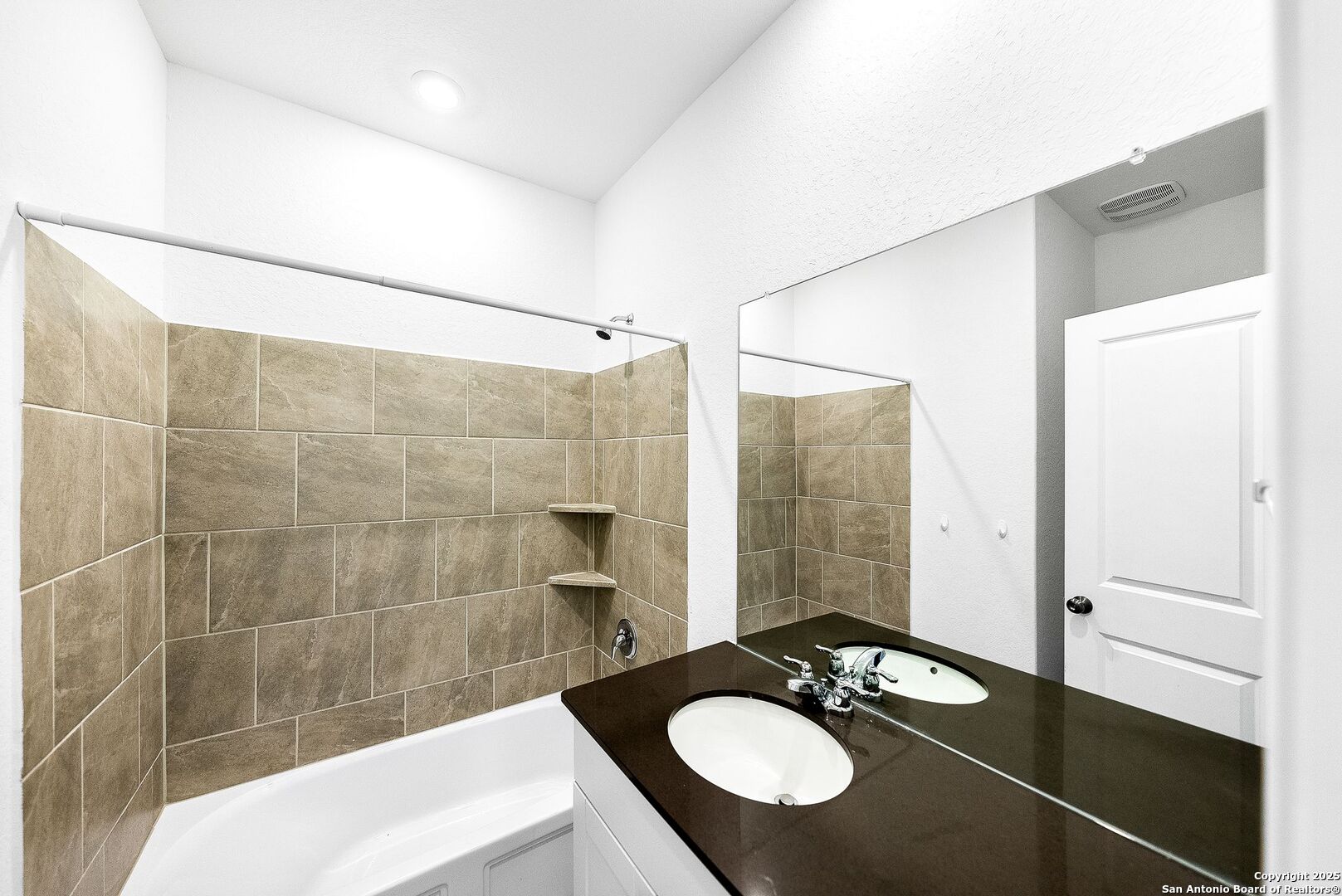 31920 Native Sun Road Bulverde, TX 78163 - Photo 29 of 62 a bathroom with a sink shower and a mirror