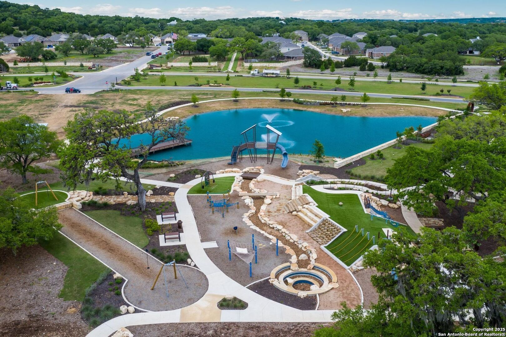 31920 Native Sun Road Bulverde, TX 78163 - Photo 40 of 62 an aerial view of a house with a swimming pool yard and outdoor seating