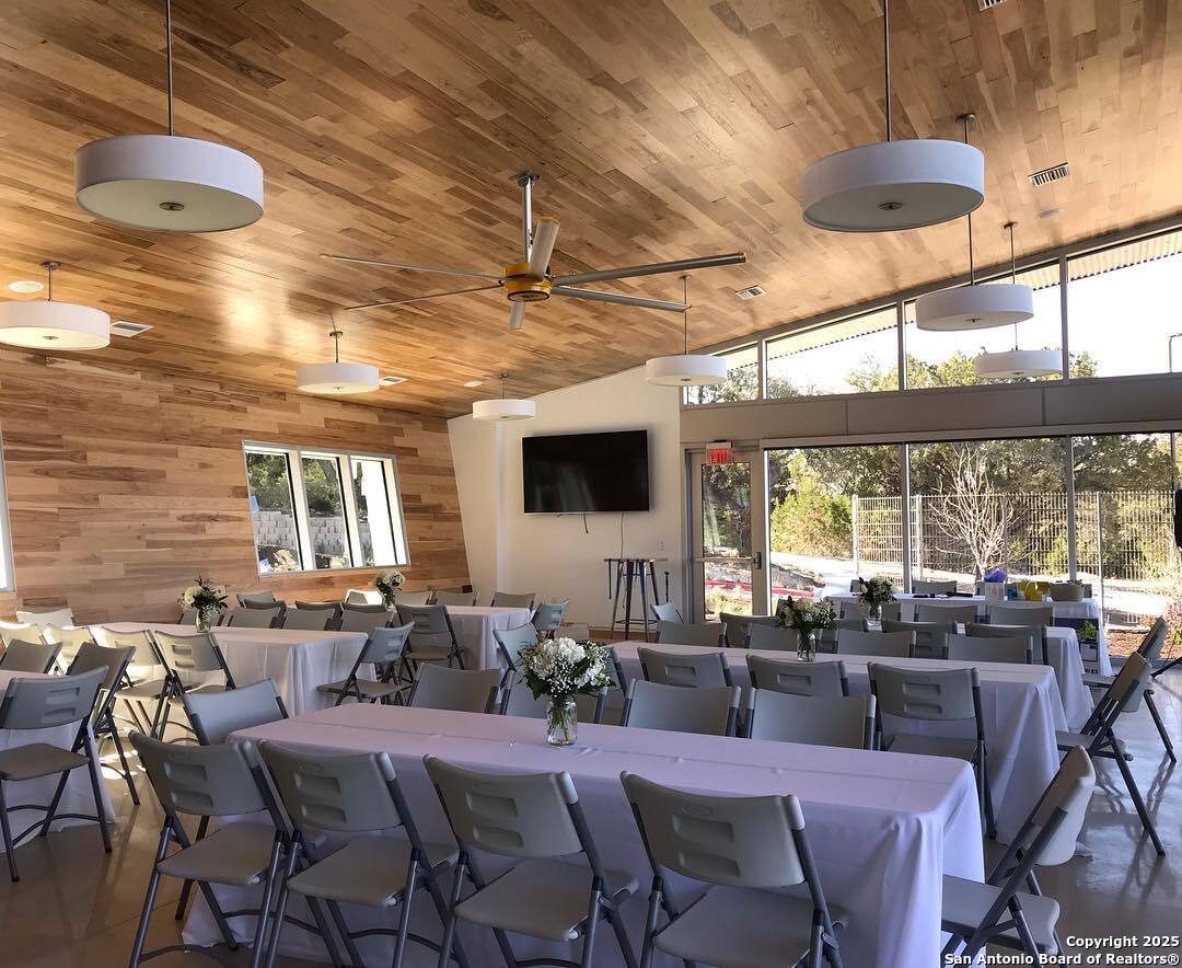 31920 Native Sun Road Bulverde, TX 78163 - Photo 48 of 62 a living room with lots of furniture and a large window