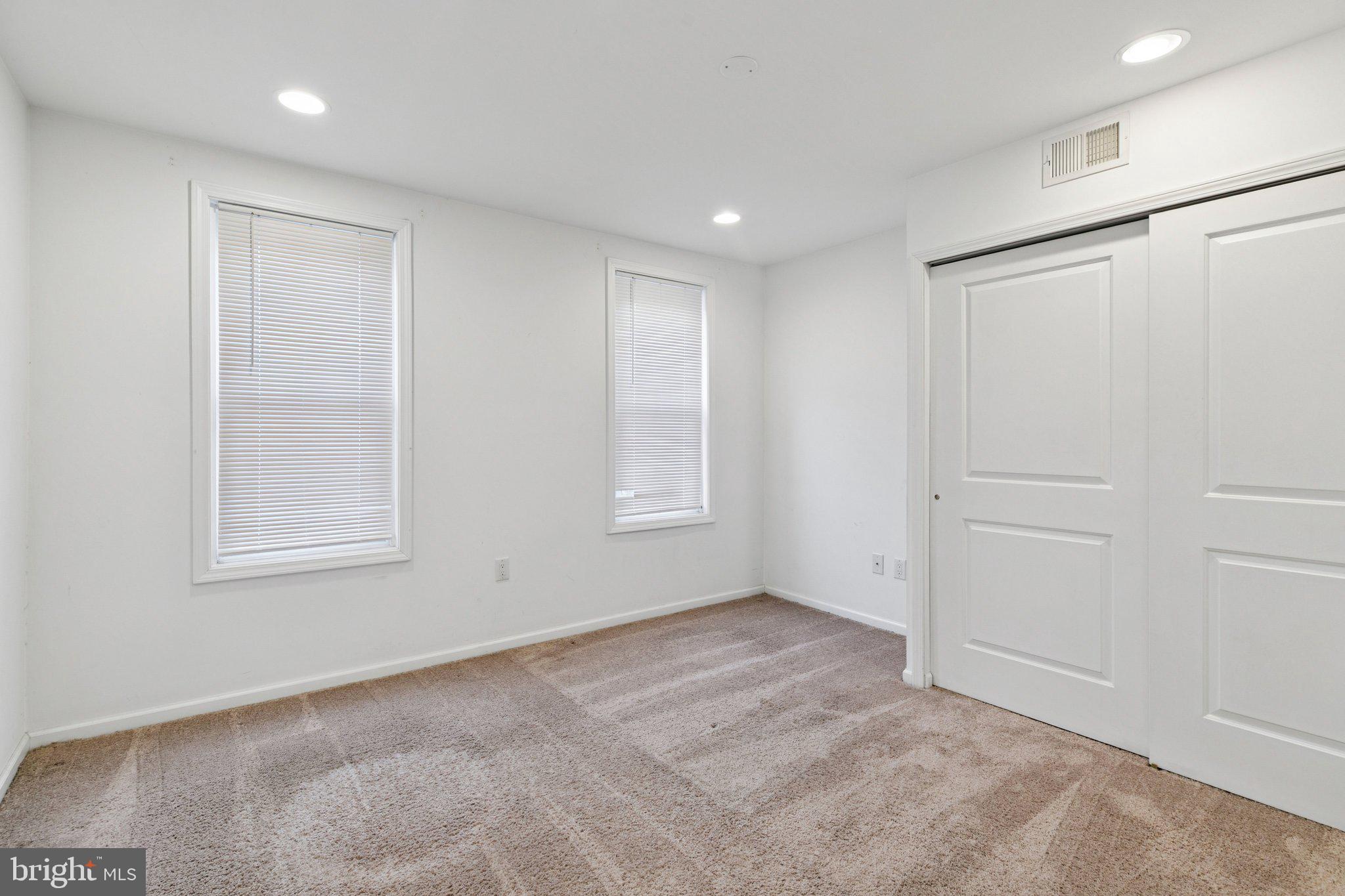 359 Lemonte Street Philadelphia, PA 19128 - Photo 13 of 37 a view of an empty room with a window