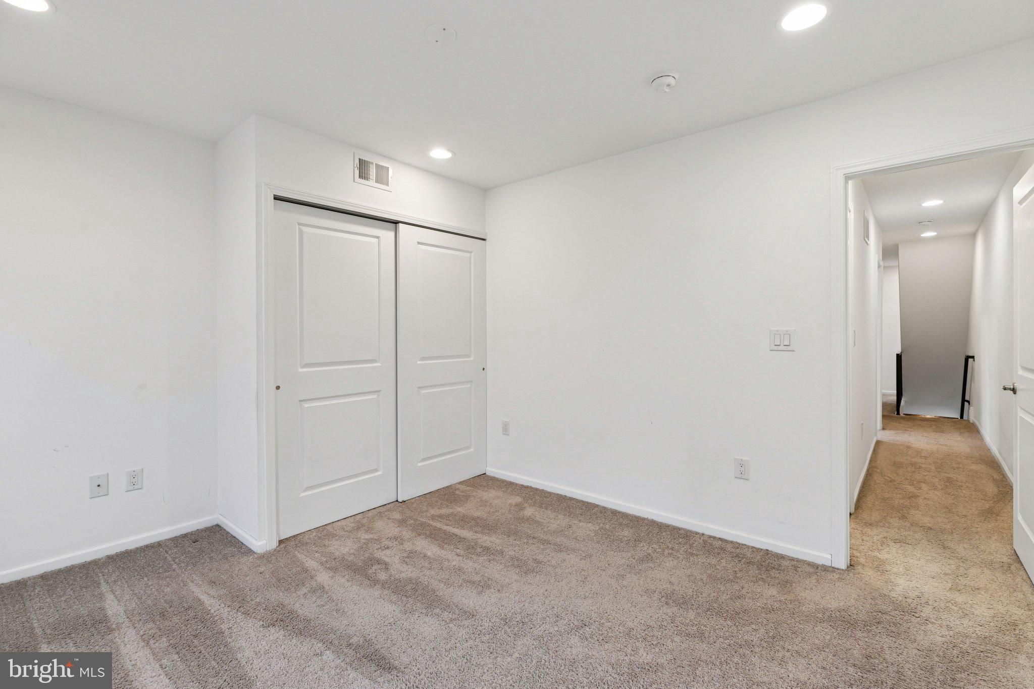 359 Lemonte Street Philadelphia, PA 19128 - Photo 14 of 37 an empty room with an entryway
