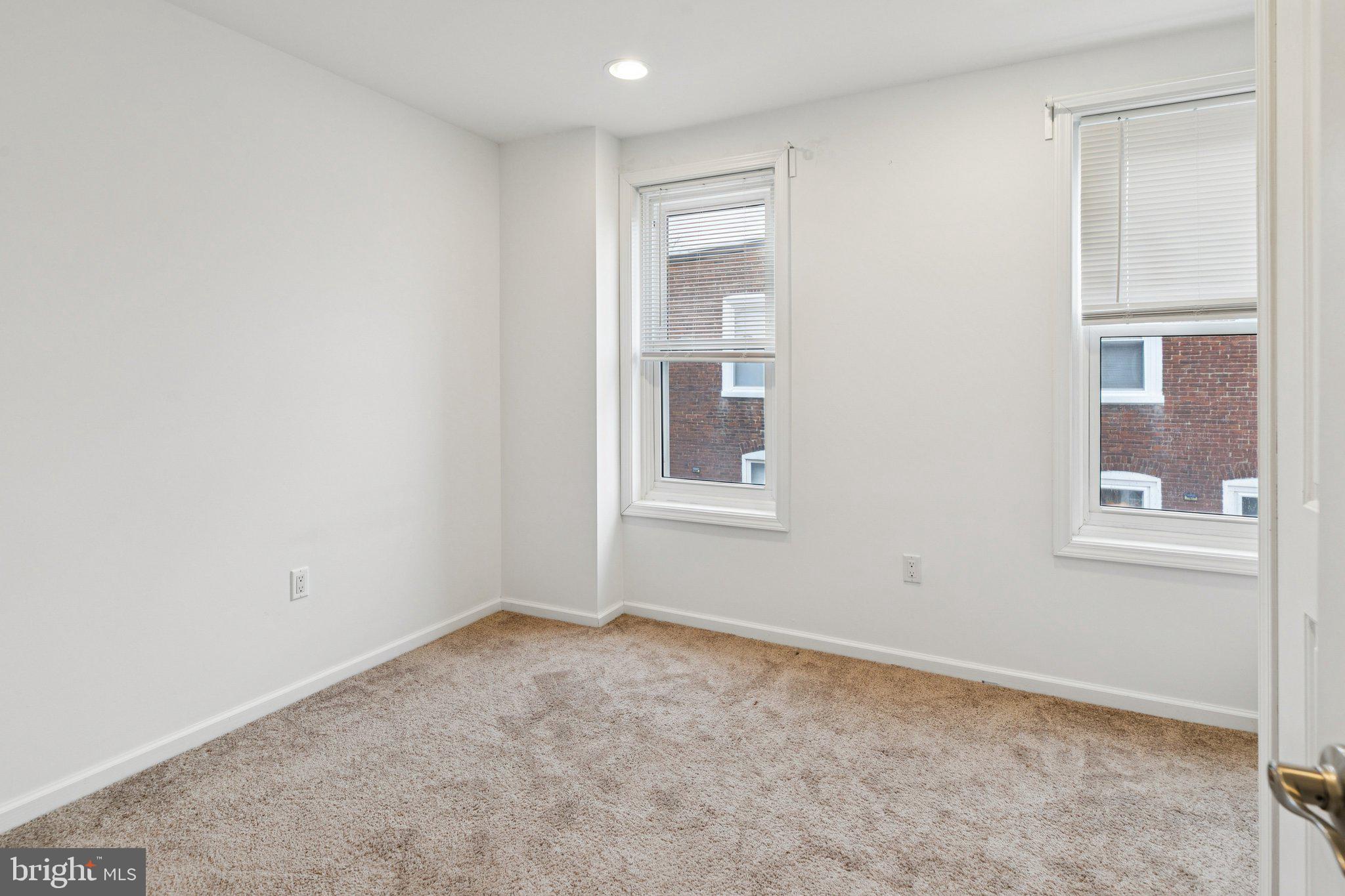 359 Lemonte Street Philadelphia, PA 19128 - Photo 17 of 37 a view of an empty room with a window