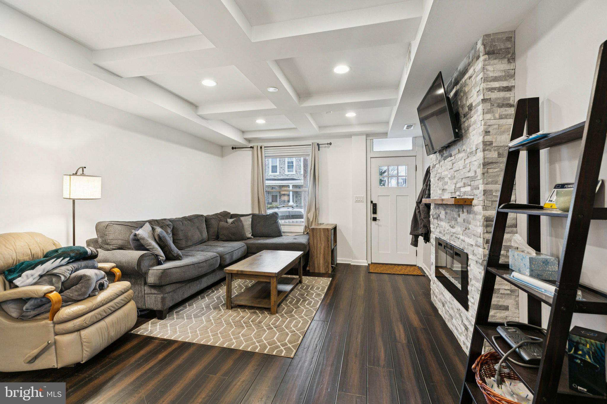 359 Lemonte Street Philadelphia, PA 19128 - Photo 4 of 37 a living room with furniture and a wooden floor