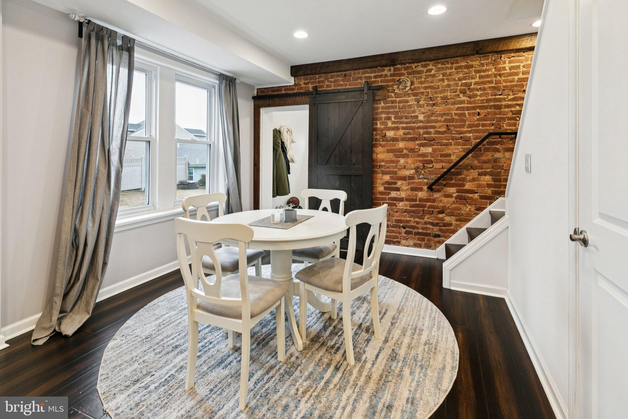 359 Lemonte Street Philadelphia, PA 19128 - Photo 9 of 37 a dining room with furniture and wooden floor