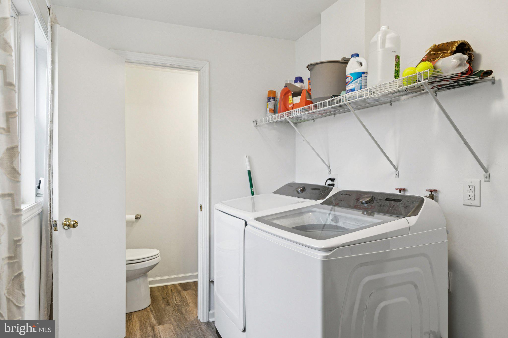 359 Lemonte Street Philadelphia, PA 19128 - Photo 10 of 37 a utility room with dryer and washer