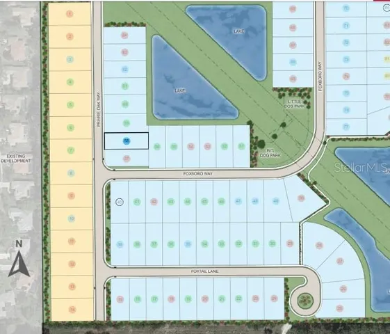 a view of a swimming pool with lounge chair under an umbrella