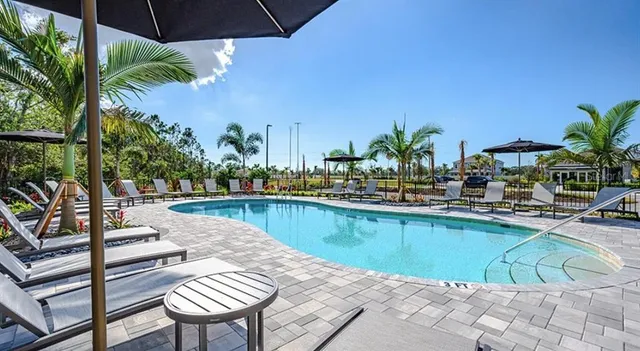 a view of an outdoor sitting area with furniture
