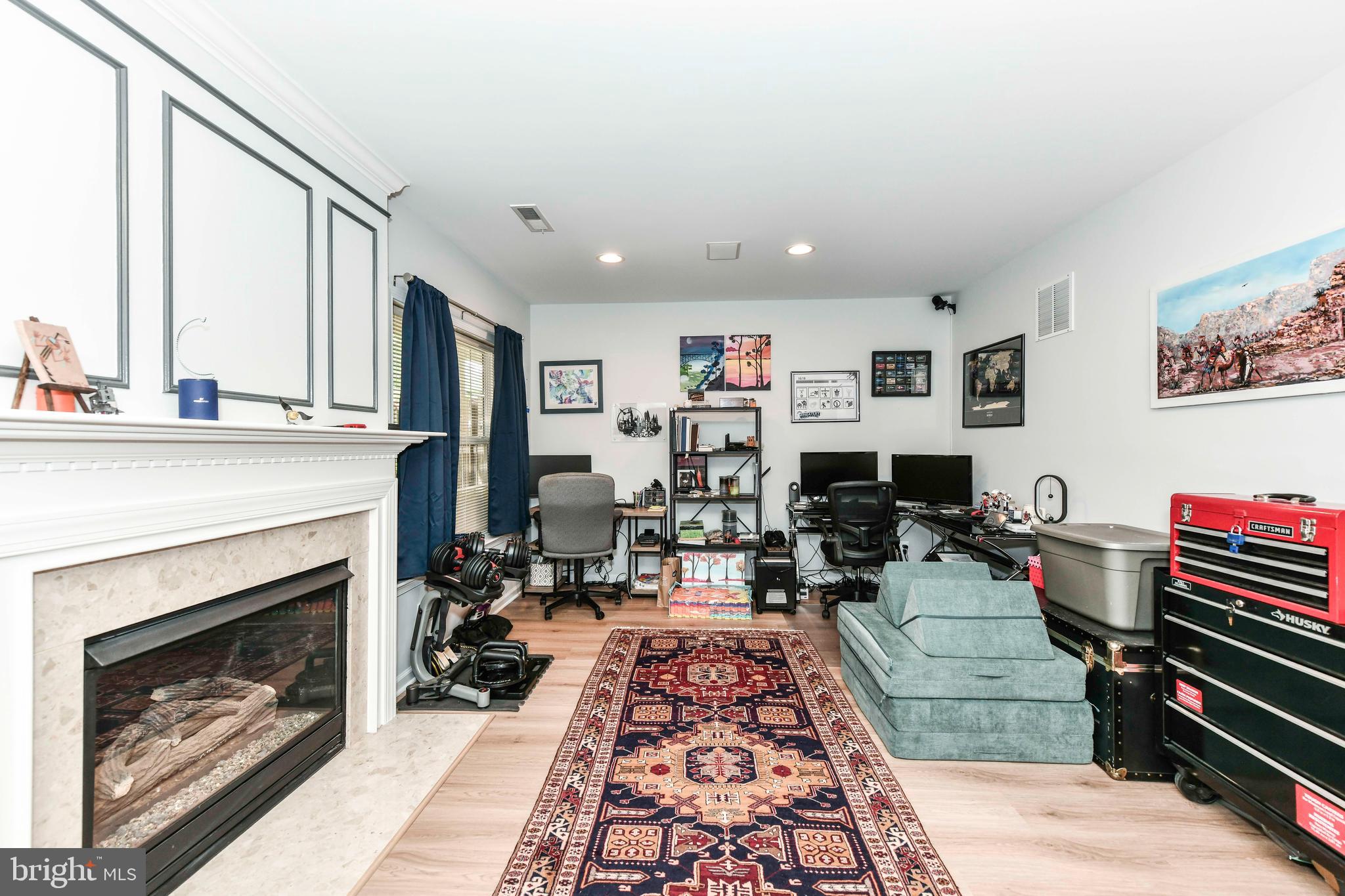 45692 Waterloo Station Square Sterling, VA 20166 - Photo 11 of 31 a living room with furniture a fireplace and next to a window