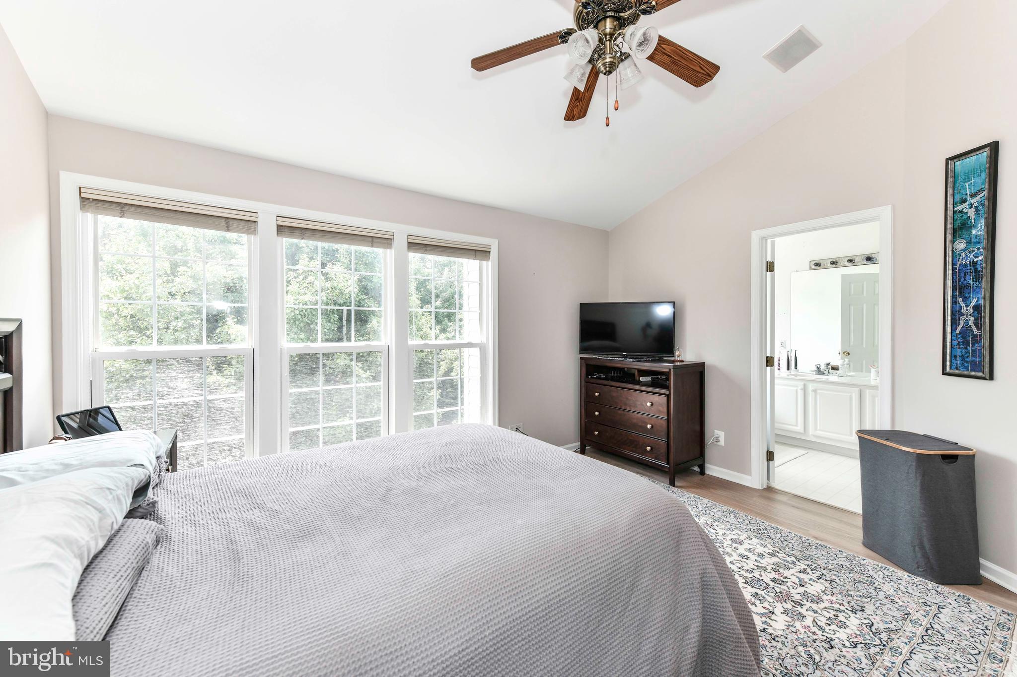 45692 Waterloo Station Square Sterling, VA 20166 - Photo 25 of 31 a bedroom with a bed and a television