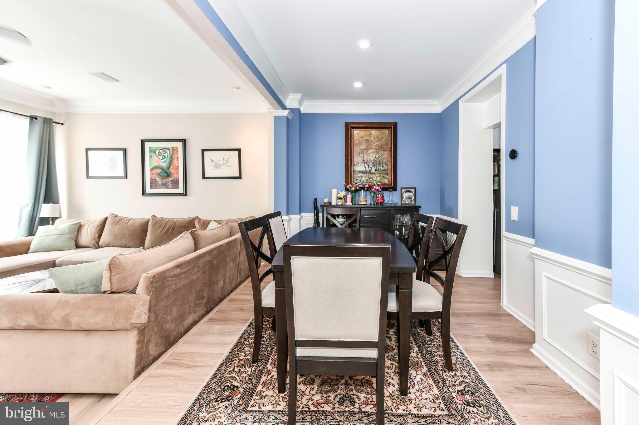 45692 Waterloo Station Square Sterling, VA 20166 - Photo 3 of 31 a view of a dining room with furniture and window
