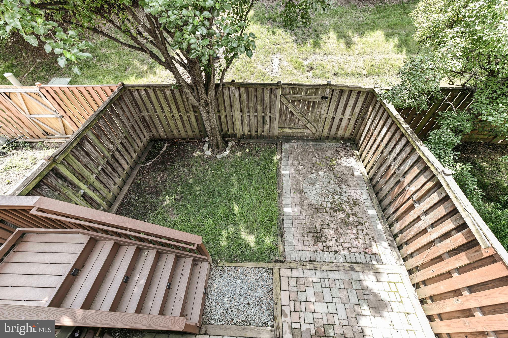 45692 Waterloo Station Square Sterling, VA 20166 - Photo 31 of 31 a view of outdoor space with deck and garden
