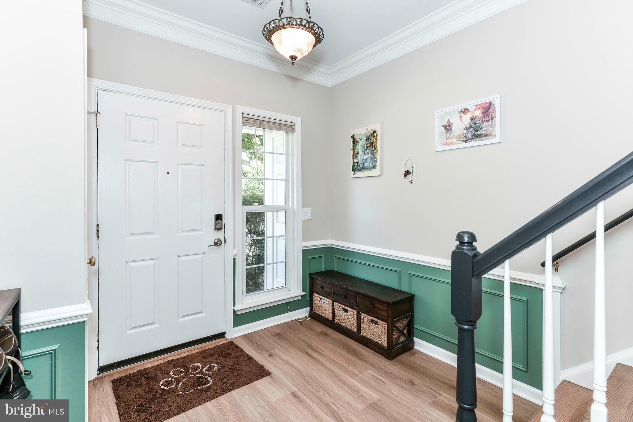 45692 Waterloo Station Square Sterling, VA 20166 - Photo 8 of 31 a living room with a baby crib furniture and a window