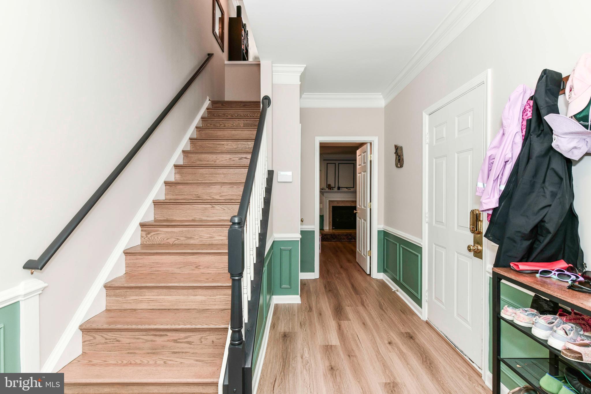 45692 Waterloo Station Square Sterling, VA 20166 - Photo 9 of 31 a view of entryway and hall with wooden floor