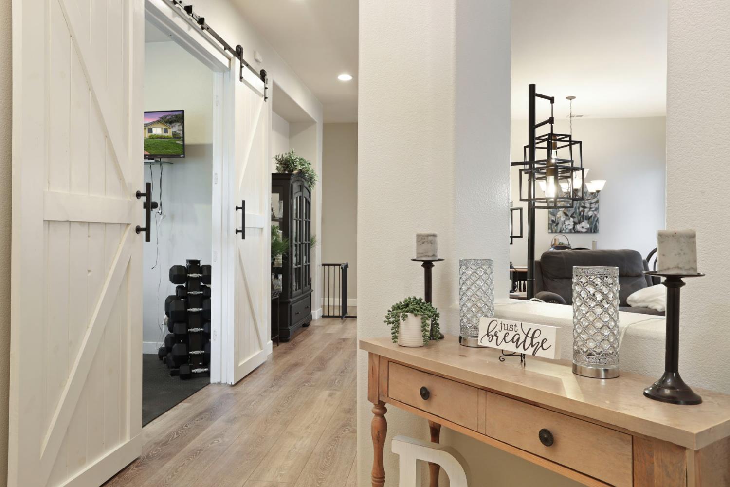 2307 Lighthouse Circle Tracy, CA 95304 - Photo 11 of 57 a room with furniture and gym equipment