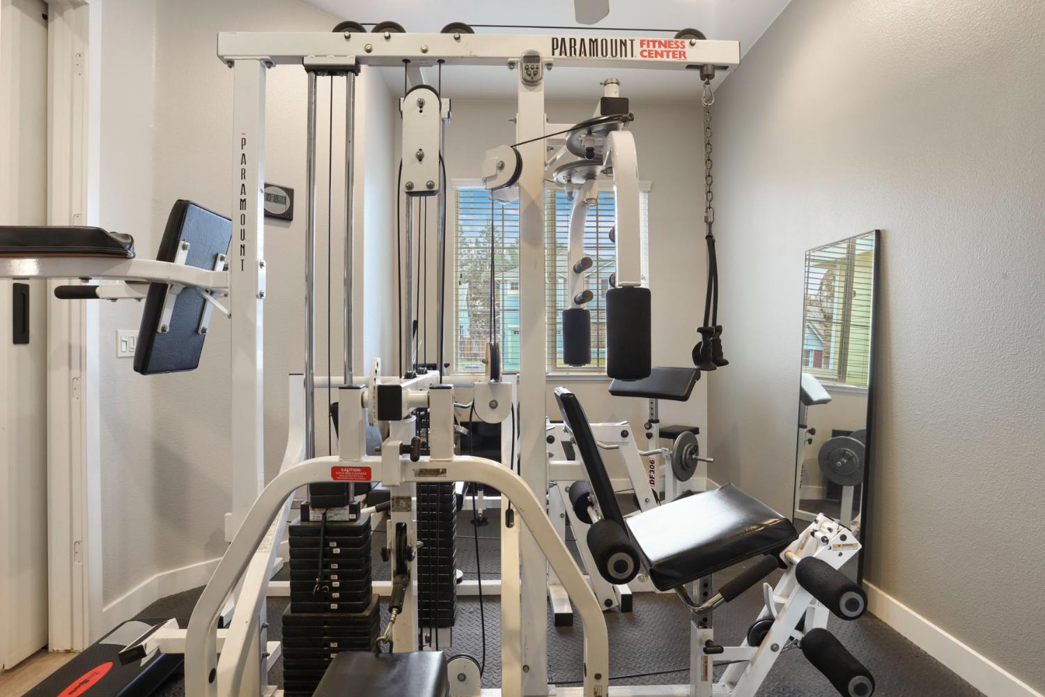 2307 Lighthouse Circle Tracy, CA 95304 - Photo 12 of 57 a view of a room with gym equipment