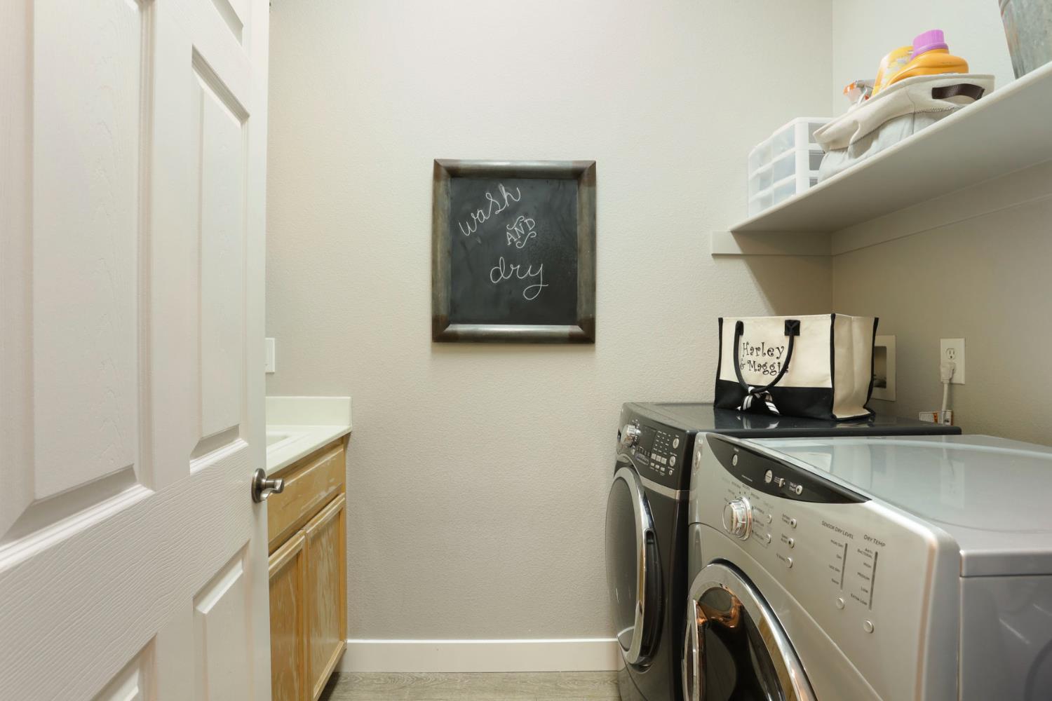 2307 Lighthouse Circle Tracy, CA 95304 - Photo 38 of 57 a utility room with dryer and washer