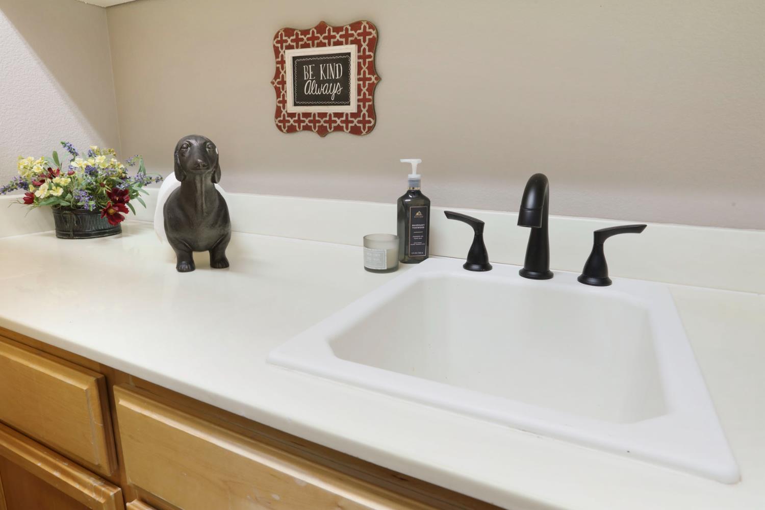 2307 Lighthouse Circle Tracy, CA 95304 - Photo 39 of 57 a bathroom with a sink and a mirror