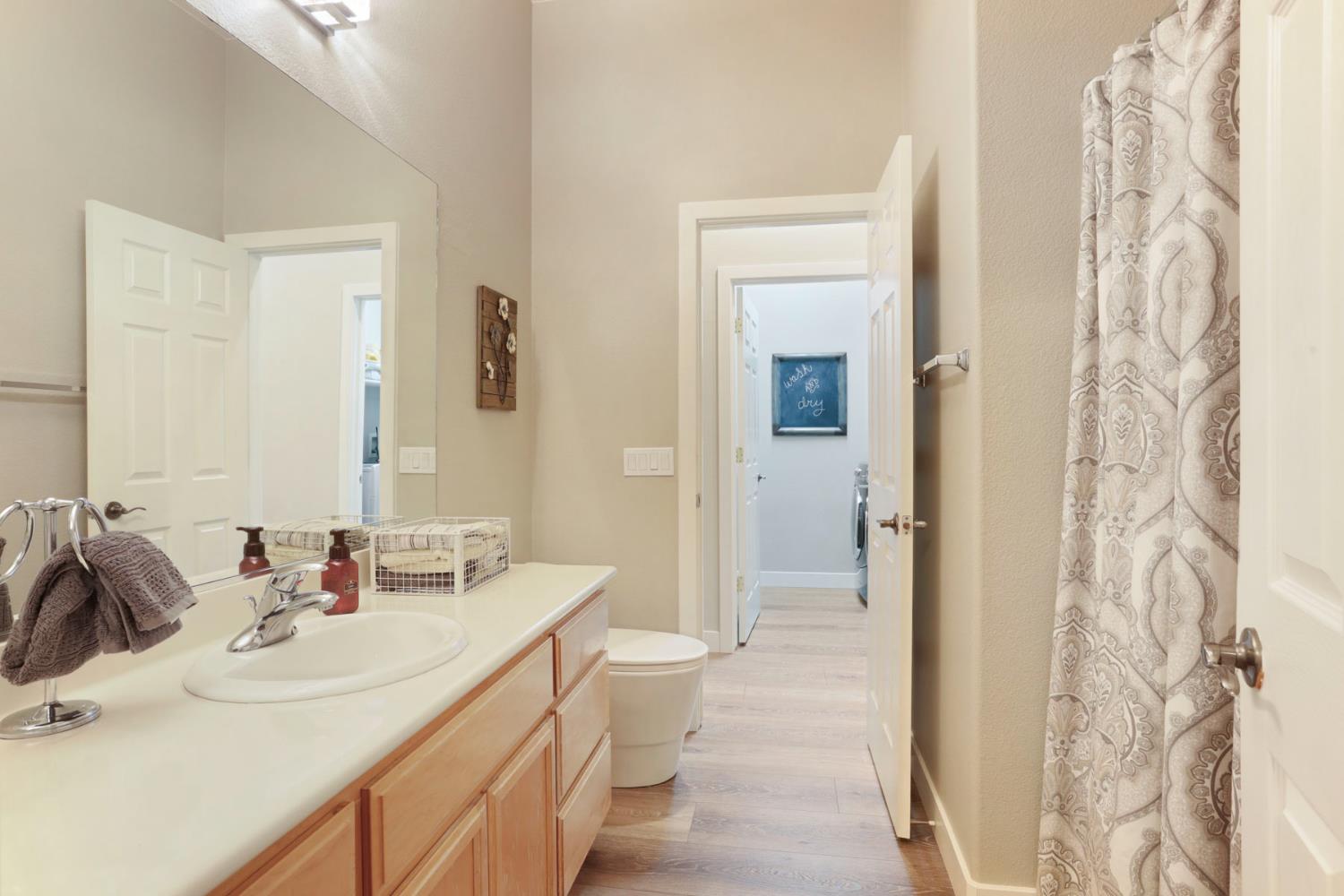2307 Lighthouse Circle Tracy, CA 95304 - Photo 41 of 57 a bathroom with a sink and a mirror