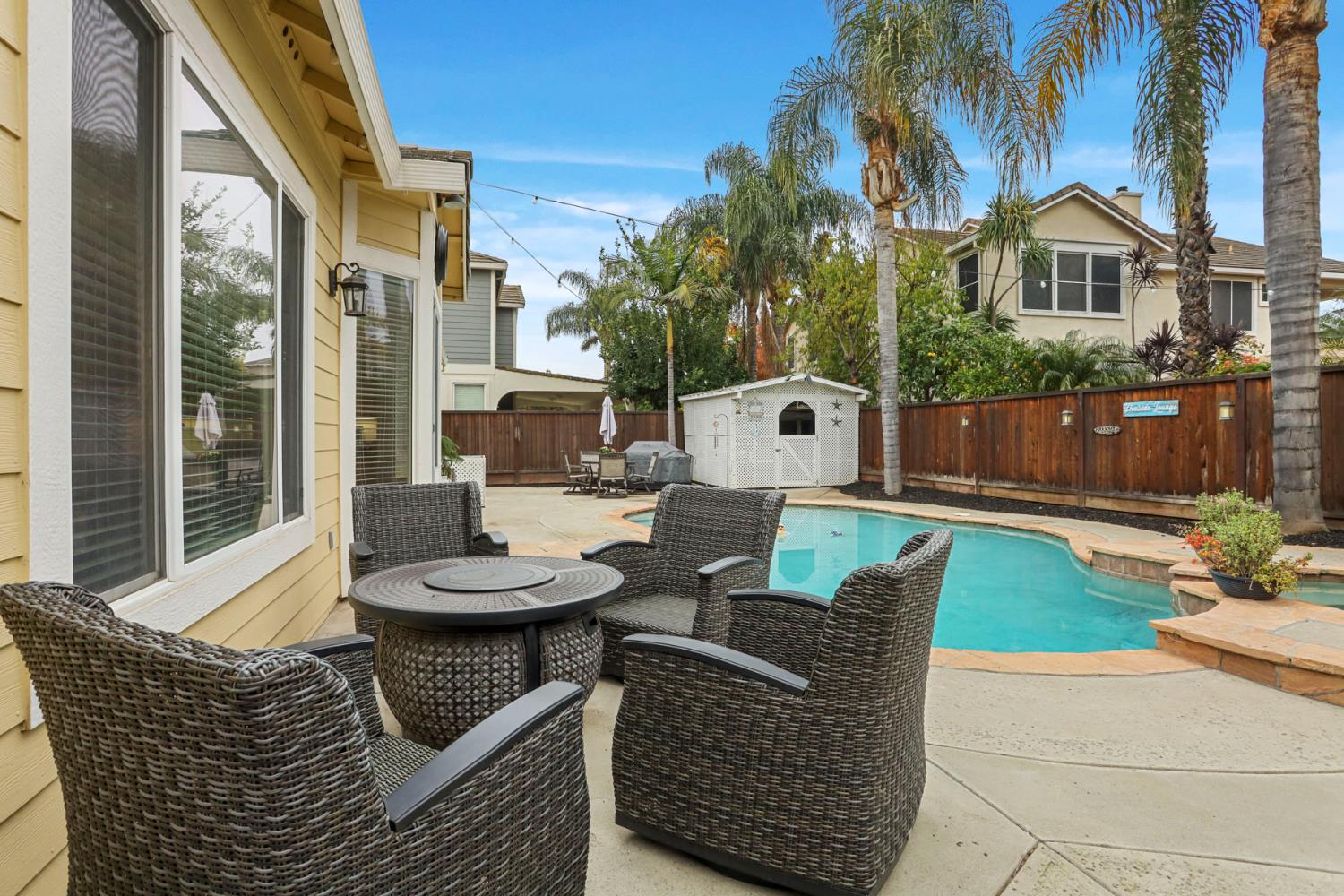 2307 Lighthouse Circle Tracy, CA 95304 - Photo 50 of 57 a view of a patio with couches chairs and a fire pit