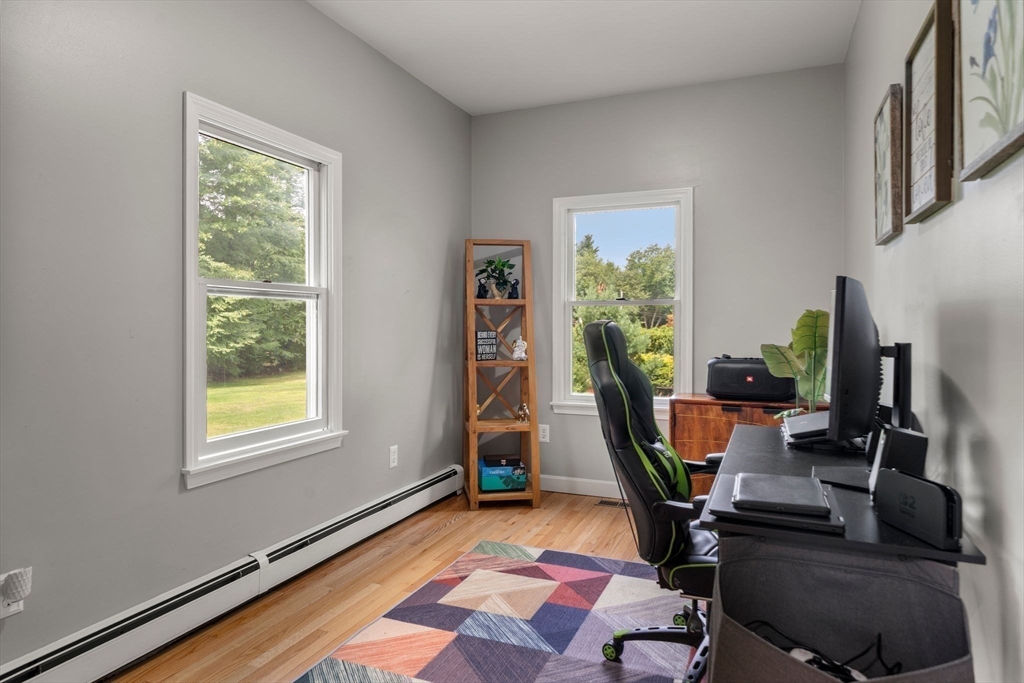 34 Wood Duck Road Acushnet, MA 02743 - Photo 14 of 23 a view of a workspace with furniture and a window