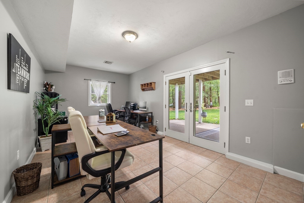 34 Wood Duck Road Acushnet, MA 02743 - Photo 15 of 23 a dining room with furniture and window