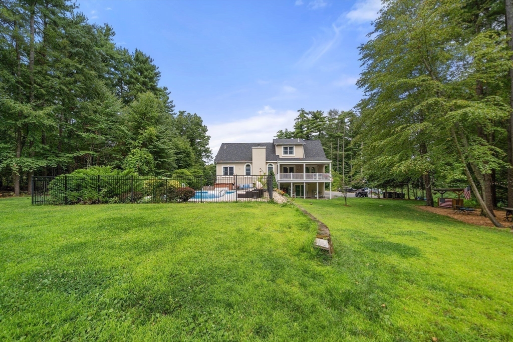 34 Wood Duck Road Acushnet, MA 02743 - Photo 23 of 23 a view of a house with a big yard