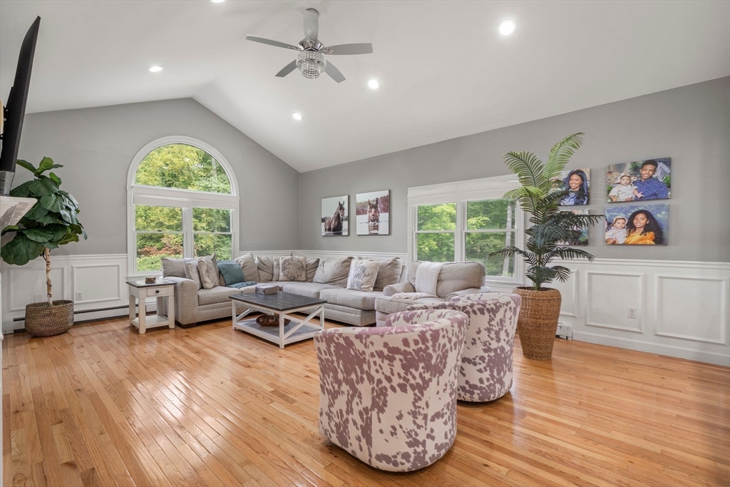 34 Wood Duck Road Acushnet, MA 02743 - Photo 8 of 23 a living room with furniture large window and wooden floor