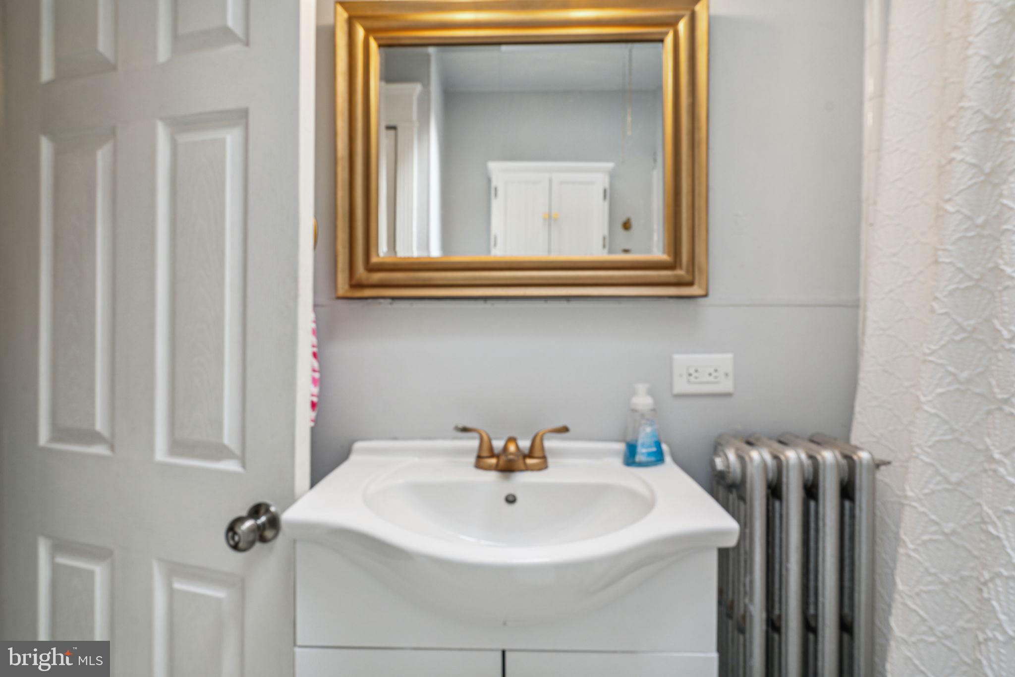 3455 Tilden Street Philadelphia, PA 19129 - Photo 19 of 32 a bathroom with a sink