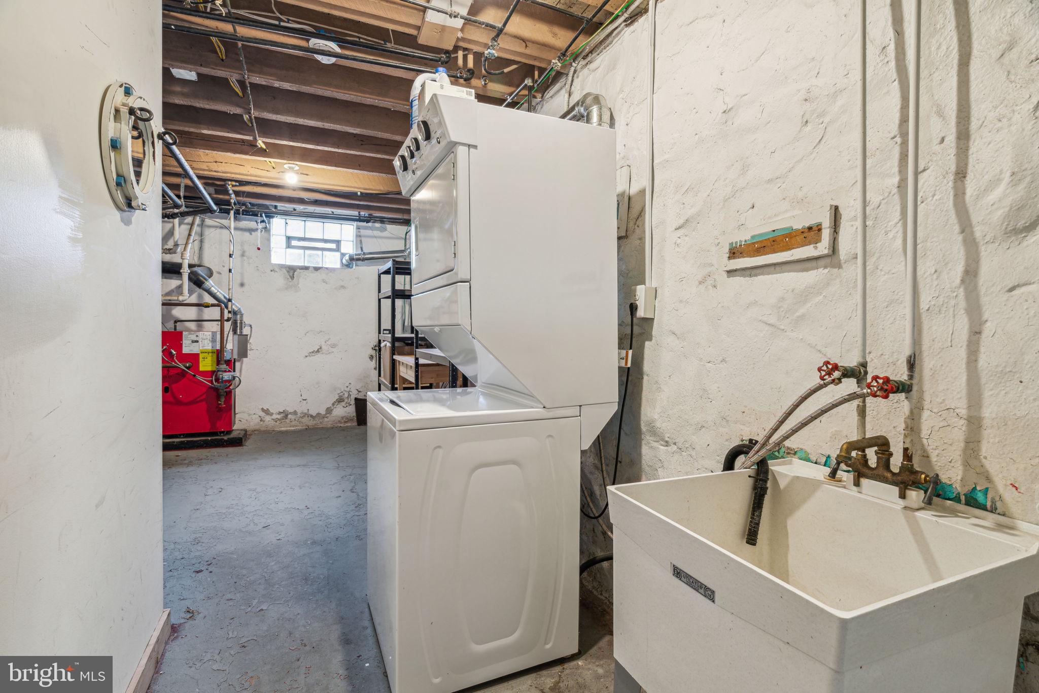 3455 Tilden Street Philadelphia, PA 19129 - Photo 29 of 32 a utility room with dryer and washer