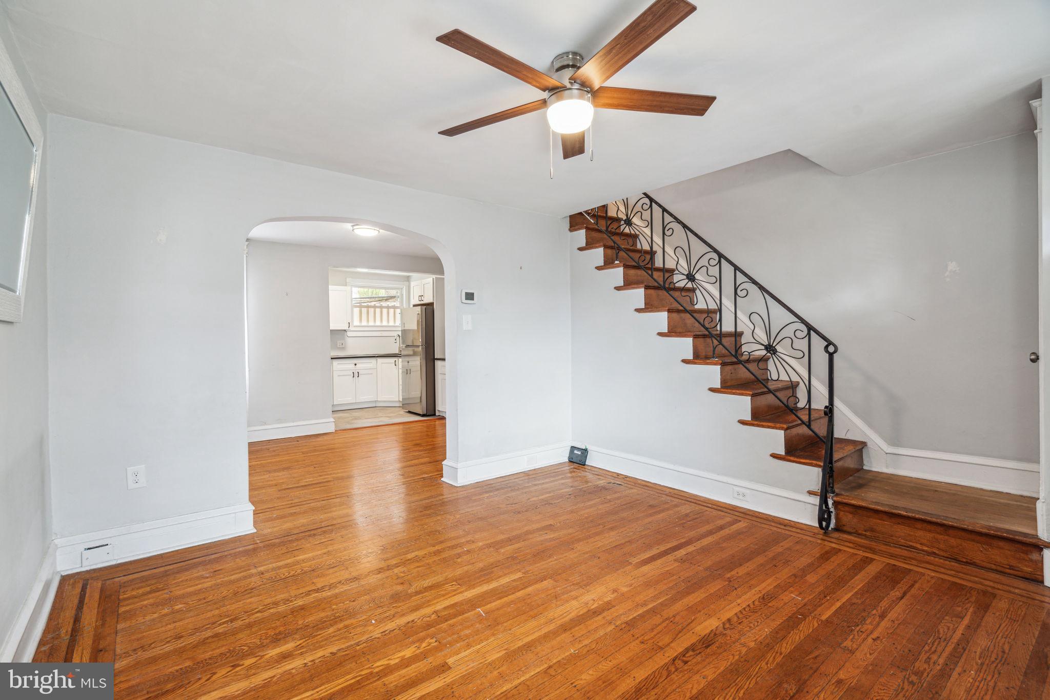 3455 Tilden Street Philadelphia, PA 19129 - Photo 4 of 32 a view of empty room with wooden floor and fan