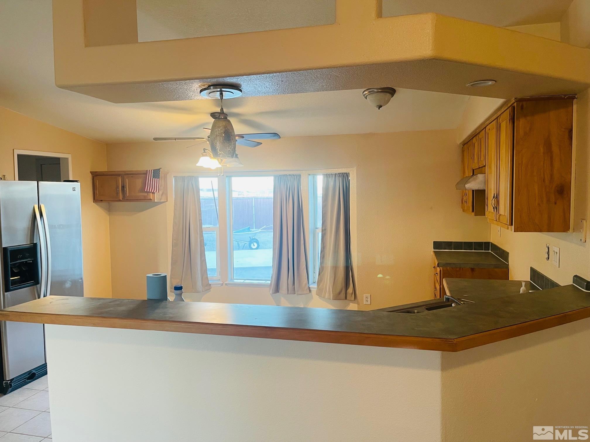 1130 Heidi Road Fallon, NV 89406 - Photo 7 of 12 a bathroom with a sink and a mirror
